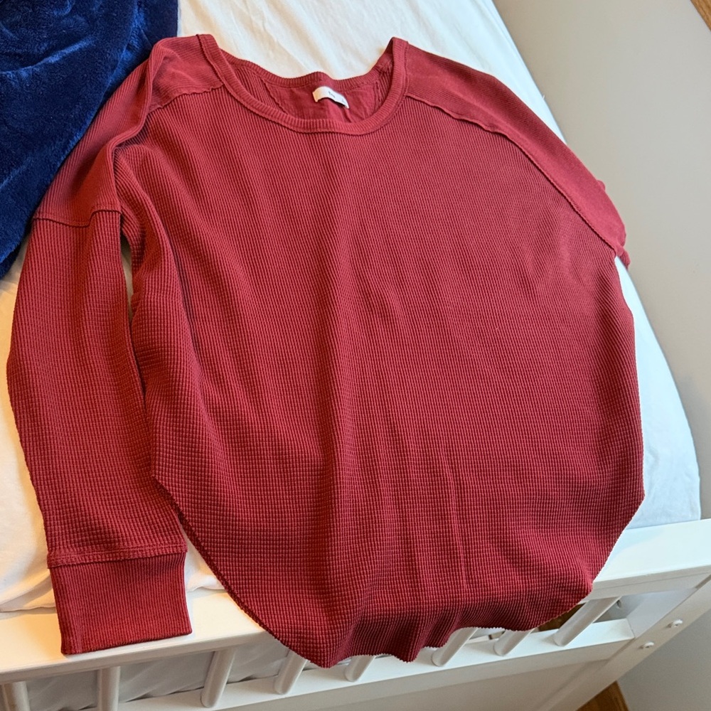 TNA Red Long Sleeve Top rounded bottom